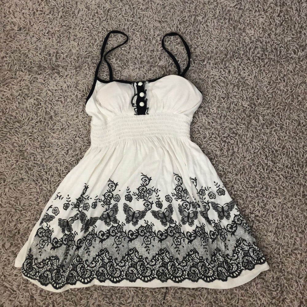 White dress with black accents/designs